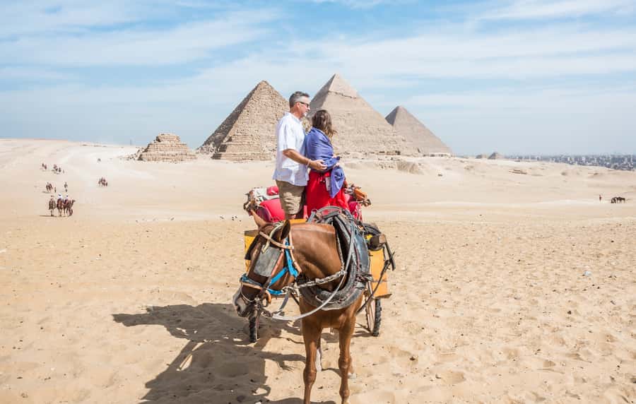 Cairo: Half Day Pyramids Tour by Camel or Horse Carriage - The Great Pyramid gives the tour its anchor