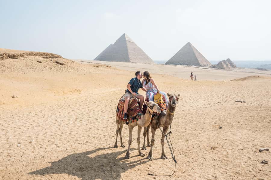 Cairo: Private Half-Day Pyramids Tour with Photographer - A camel ride with the Pyramids in view
