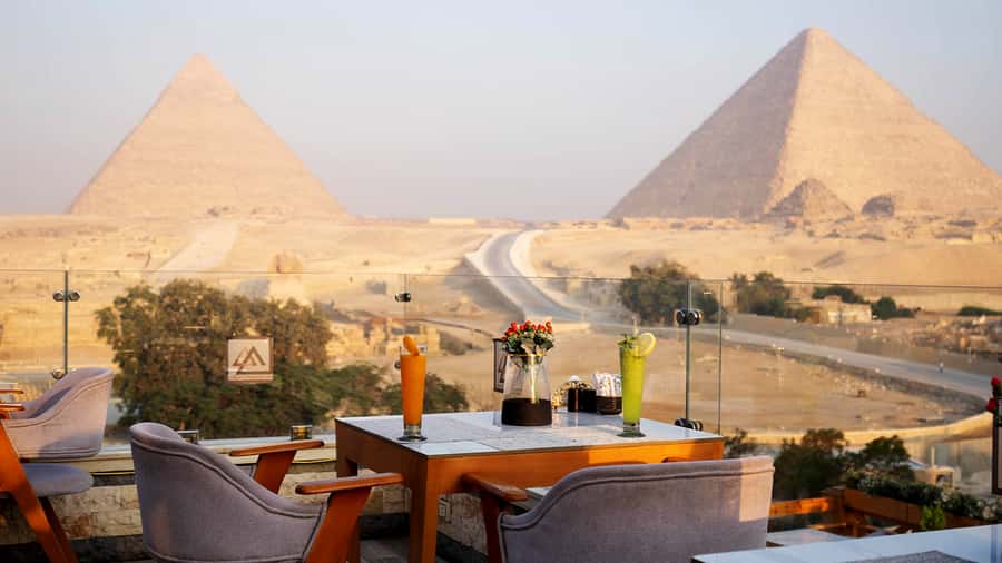 Cairo: Sunrise Camel Ride, Pyramids Tour & Local Breakfast. - Egyptian breakfast with a view