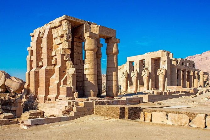 Day Trip To Luxor From Cairo By Plane - The Colossi of Memnon: a brief stop with big statues