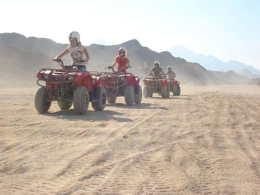 Desert Sunset Quad Bike ATV for 50Km, Oriental Show, Dinner, - Learning the quad bike at the station