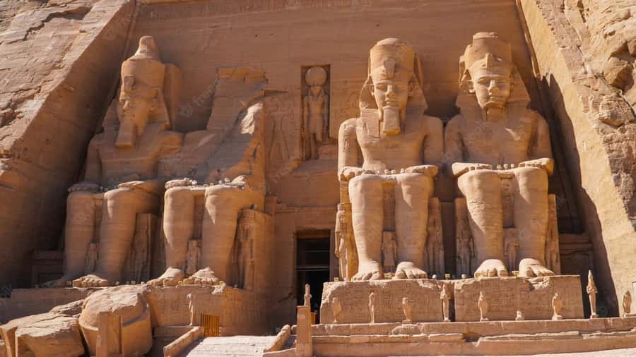 From Aswan: Abu Simbel Temple Day Trip with Hotel Pickup - First sight: the four seated statues