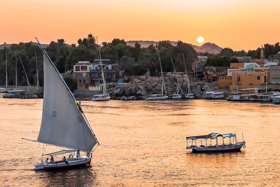 From Aswan: Philae Temple & Motorboat Tour to Nubian Village - Entering the Nubian village near Soheil Island