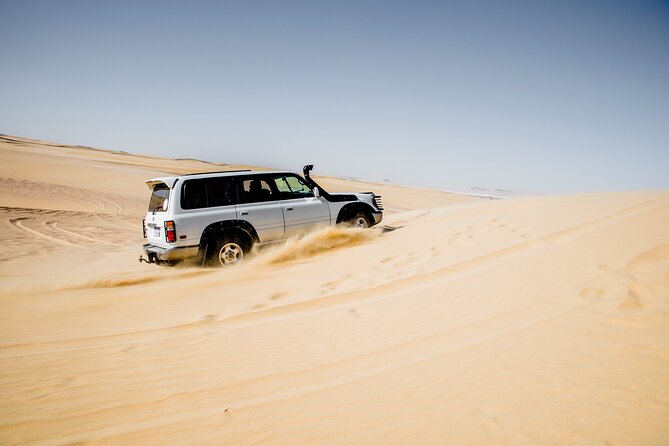 From Cairo 4x4 Safari, Camel Ride, Magic Lake, Waterfalls & Lunch - 4x4 dunes and sandboarding in Wadi El Rayan