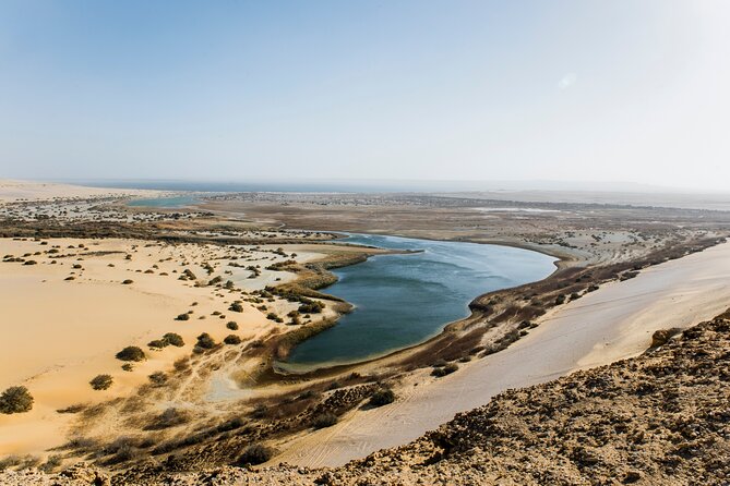 From Cairo: Desert Safari, Waterfalls, Sand boarding and Camel ride with Lunch - Mudawara Mountains and the Big Desert Views