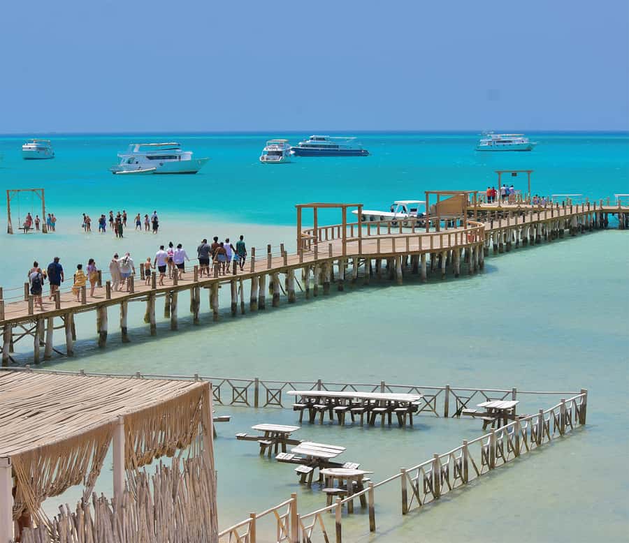 From Hurghada: Giftun Island Cruise with Lunch & Watersports - Coral snorkeling in water that can get crowded