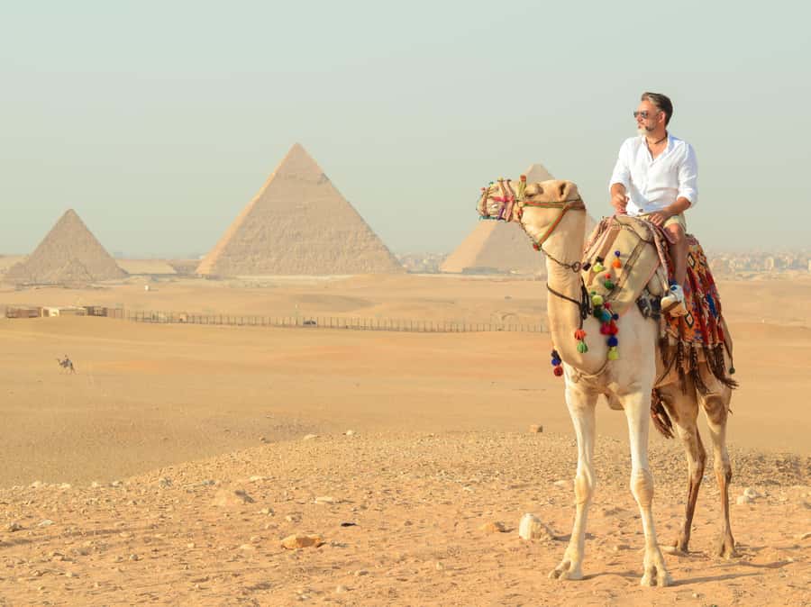 Giza Sunrise Pyramid Guided Tour With Camel Ride & Breakfast - The camel and horse ride: memorable, but choose with care