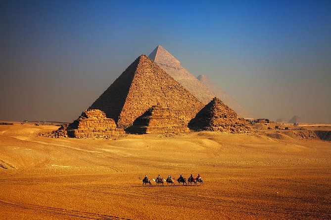 Guided trip to Giza pyramids Sphinx with lunch - Lunch, camel rides, and extra costs