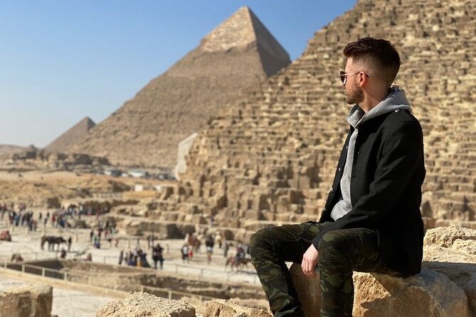 Half Day Tour to Giza pyramids, sphinx Lunch and camel ridding - A camel ride beside the desert monuments