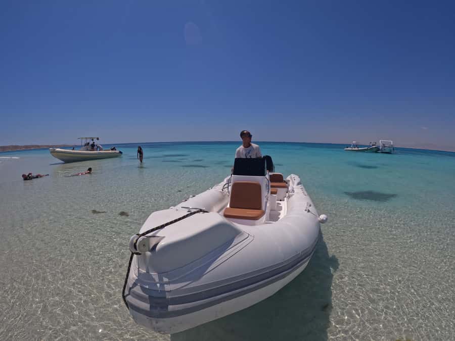 Hurghada: 4 Island Hopping Tour Dolphin, Snorkeling & Lunch - Searching for dolphins in open water