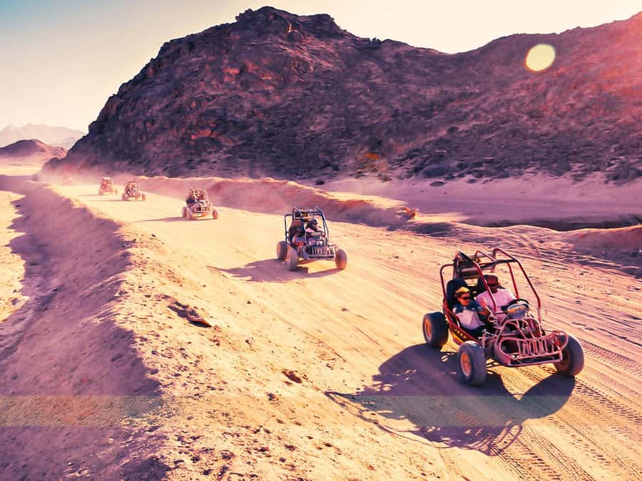 Hurghada: ATV Tour with Camel Ride, Dinner Show & Stargazing - Sunset dinner, music, and the desert show