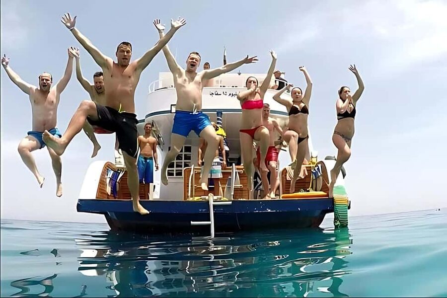 Hurghada: Dolphin Cruise with Snorkeling & Buffet Lunch - Lunch, shade, and the useful middle of the day