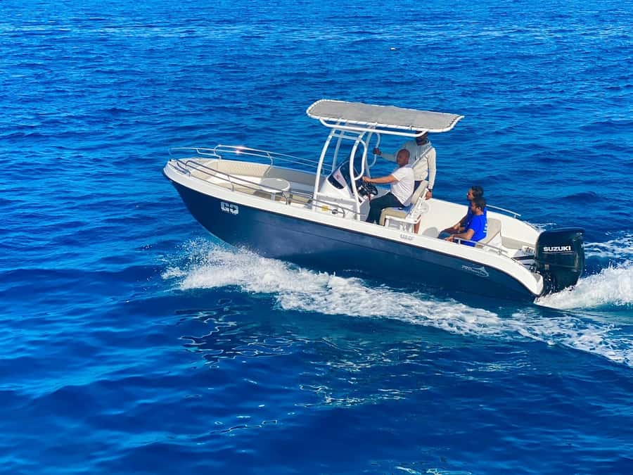 Hurghada: Orange Bay Dolphin Watching, Snorkeling & Lunch - Two snorkeling sites, about an hour in the water