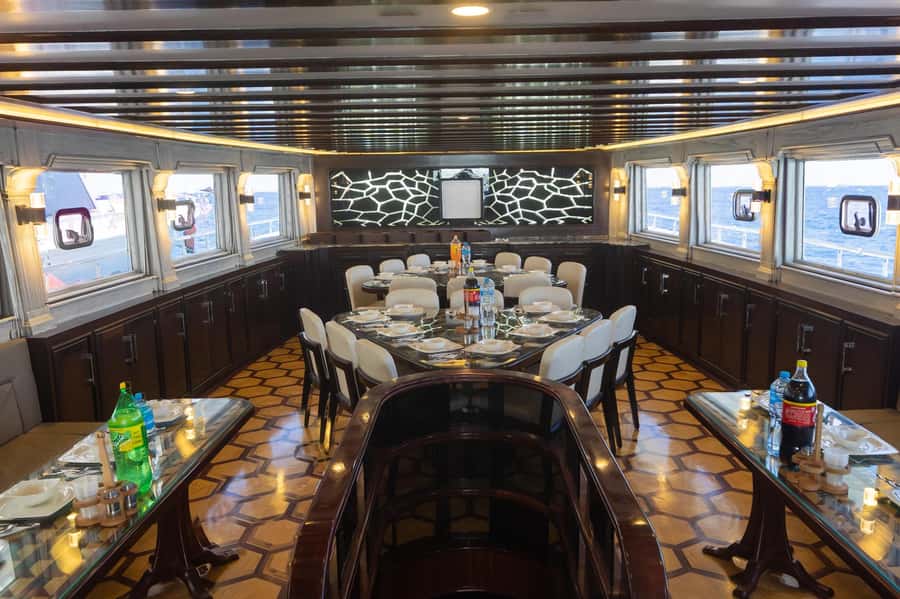 Hurghada: Orange & Giftun Island Cruise with Massage & Lunch - Lunch arrives with fish, salads, and BBQ dishes