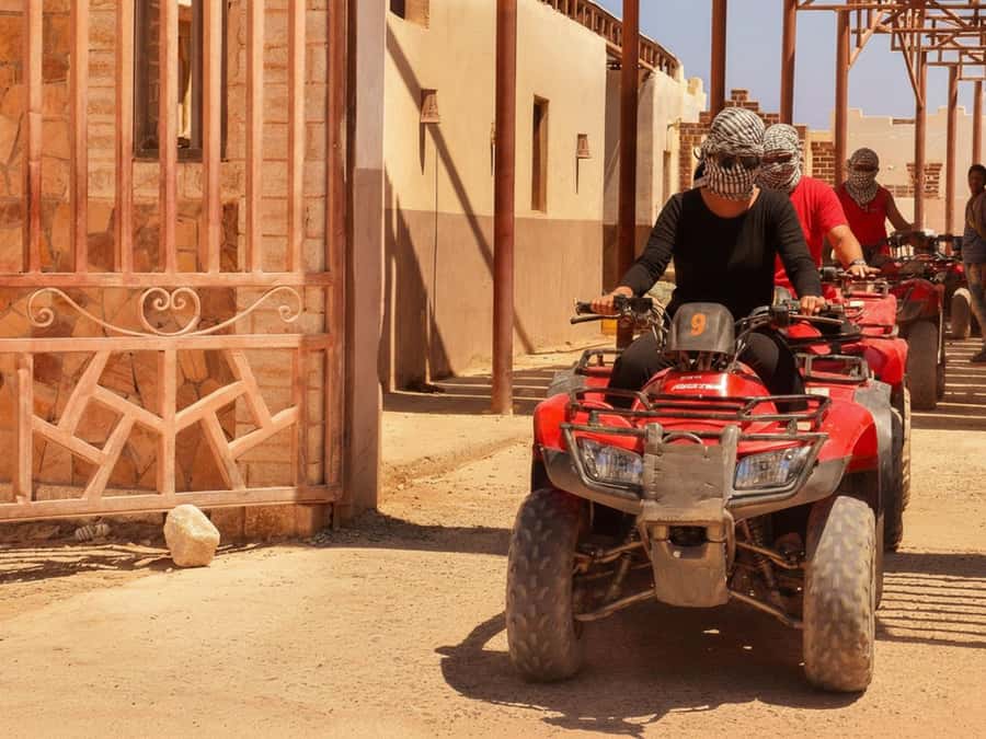Hurghada: Sunset Quad Bike, Camel w/ Opt Stargazing and BBQ - From hotel pickup to the desert base
