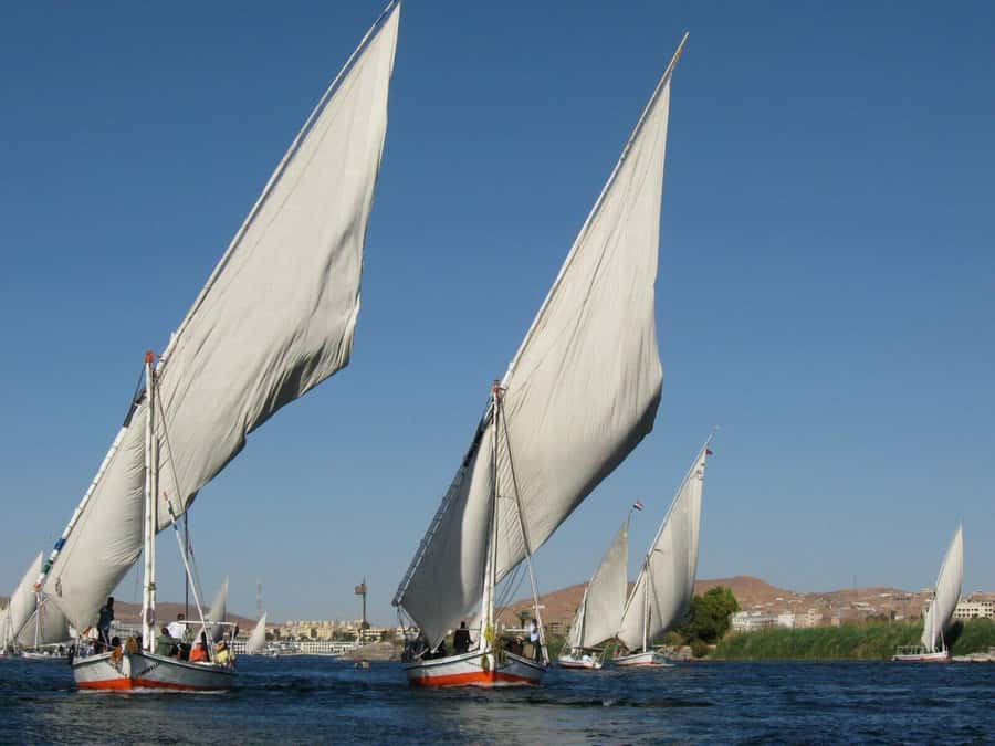 Luxor: Private Felucca Boat Trip with Hotel Pickup - Reaching the sunset over the West Bank