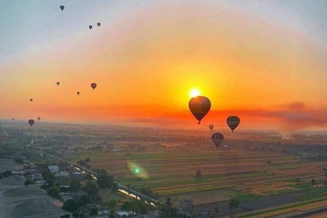 Luxury Sunrise Balloon Ride in Luxor with Hotel Pickup - Watching the balloons prepare for takeoff