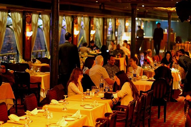 Nile Dinner Cruise in Cairo with Belly Dancing and Hotel Transfer - Boarding the boat and finding your place