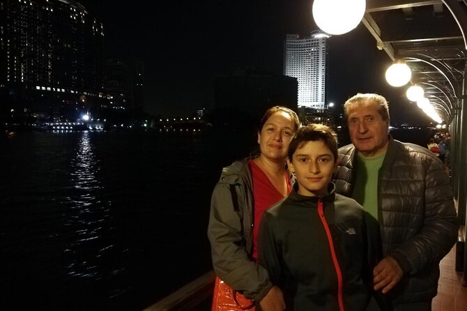 Nile Dinner Cruise in Cairo With Belly Dancing and Transfer - Cairo by night from a moving restaurant