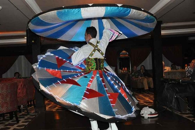 Nile Maxim Dinner Cruise In Cairo - Tannura and Belly Dancer-Oriental Show show - Boarding after dark and seeing Cairo from the water