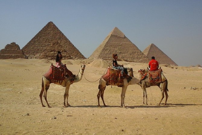 Sightseeing Day Tour to Pyramids, Egyptian Museum and Bazaar from Giza or Cairo - Giza Plateau: three pyramids and one famous guardian