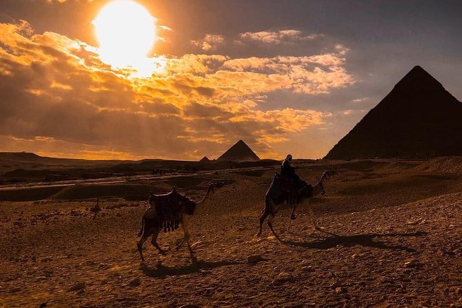 Unusual Desert Safari Tour Around Giza Pyramids During Sunset With Barbecue. - Quad biking across the desert near the pyramids