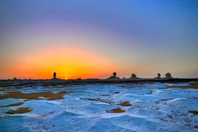 White & Black desert camping tour 2 Days 1 night From Cairo - Black Desert: dark hills and volcanic rock